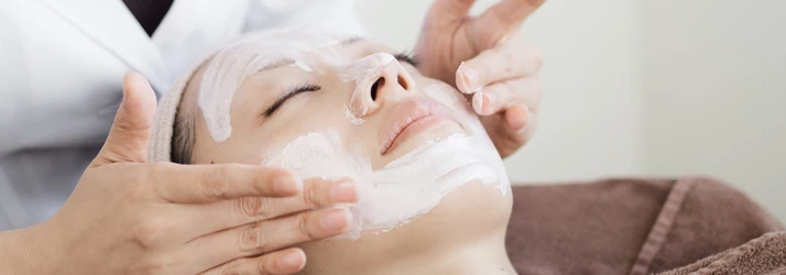 Chiropractic Superior WI Woman Receiving Facial Treatment Woman Receiving Facial Treatment